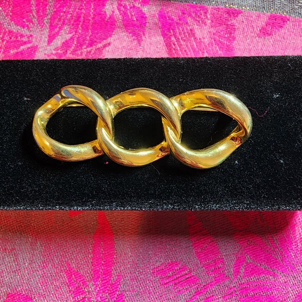 Gold Tone Triple Interlocking Link Brooch.